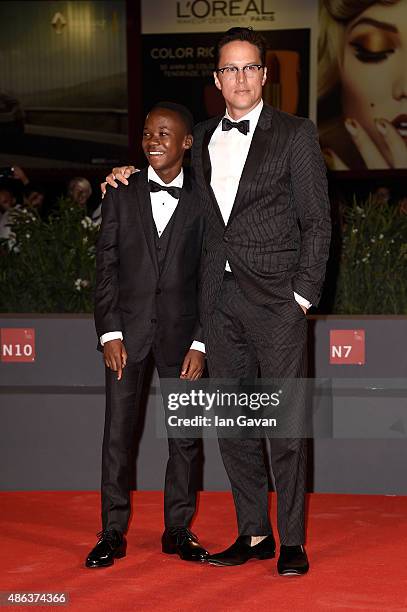 Actor Abraham Attah and director Cary Fukunaga attend the premiere of 'Beasts Of No Nation' during the 72nd Venice Film Festival on September 3, 2015...