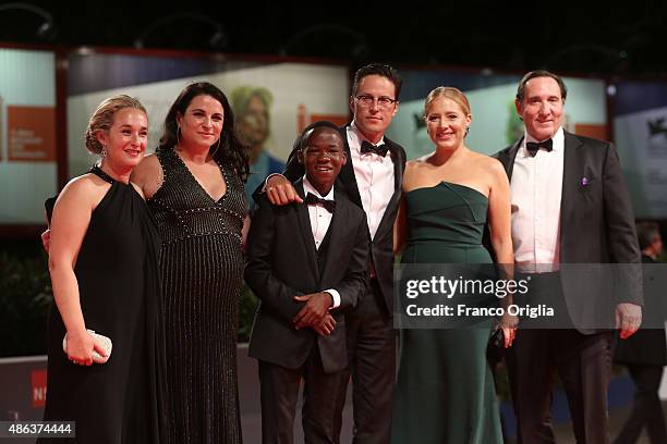 Actor Abraham Attah and director Cary Fukunaga and guests attend the premiere of 'Beasts Of No Nation' during the 72nd Venice Film Festival on...