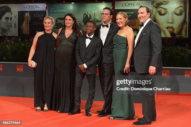 Actor Abraham Attah and director Cary Fukunaga and guests attend the premiere of 'Beasts Of No Nation' during the 72nd Venice Film Festival on...