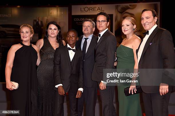 Actor Abraham Attah and director Cary Fukunaga and guests attend the premiere of 'Beasts Of No Nation' during the 72nd Venice Film Festival on...