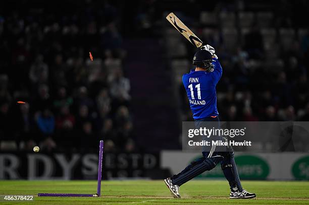 Steven Finn of England is clean bowled by Pat Cummings to give Australia victory in the 1st Royal London One-Day International match between England...