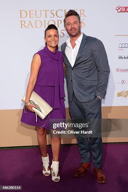 Julia Roentgen and Sasha poses during the Deutscher Radiopreis 2015 at Schuppen 52 on September 3, 2015 in Hamburg, Germany.