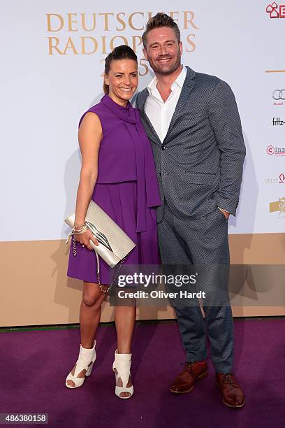 Julia Roentgen and Sasha poses during the Deutscher Radiopreis 2015 at Schuppen 52 on September 3, 2015 in Hamburg, Germany.