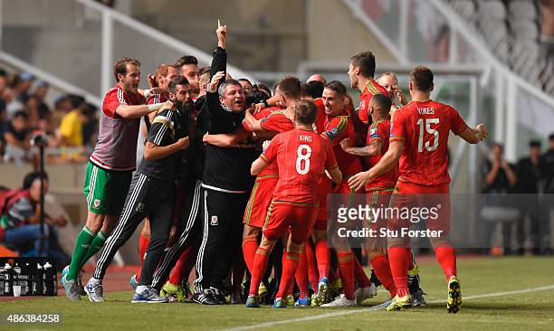 The Wales bench celebrate the opening goal during the UEFA EURO 2016 Qualifier between Cyprus and Wales at GPS Stadium on September 3, 2015 in...