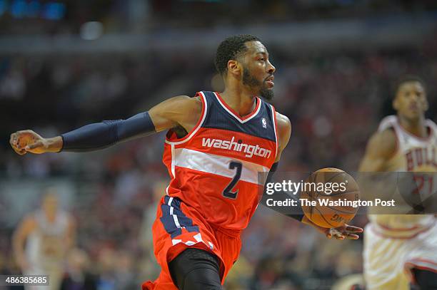 Washington guard John Wall goes up for a 2nd half dunk on a 2nd half steal as the Washington Wizards play the Chicago Bulls in game 1 of the Eastern...