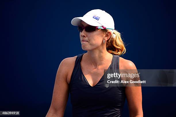 Anastasia Rodionova of Australia reacts against Eva Hrdinova of the Czech Republic and Bojana Jovanovski of Serbia during their Women's Doubles First...