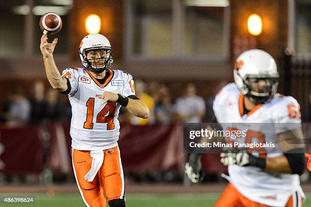 Travis Lulay of the BC Lions throws the ball during the CFL game against the Montreal Alouettes at Percival Molson Stadium on September 3, 2015 in...