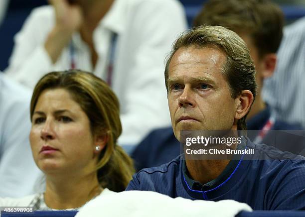 Wife Mirka Federer and coach Stefan Edberg watch Roger Federer of Switzerland play Steve Darcis of Belgium during their Men's Singles Second Round...