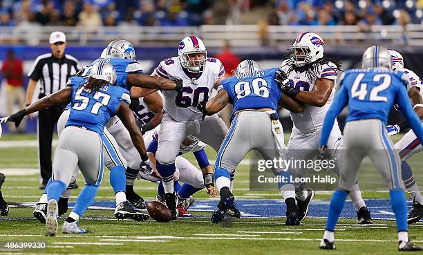 Matt Simms of the Buffalo Bills fumbles the ball during the first quarter of the preseason game against the Detroit Lions on September 3, 2015 at...