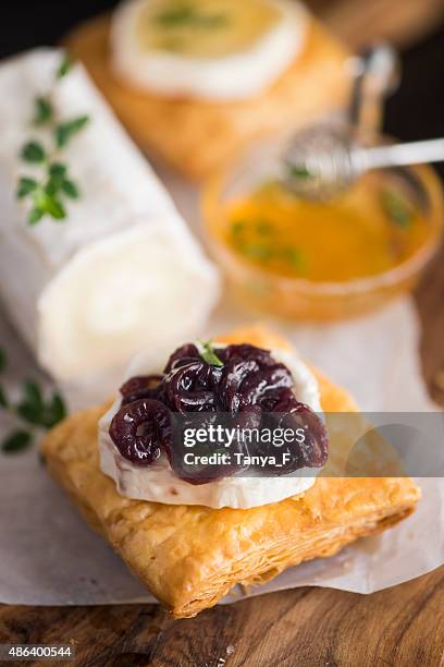 goat cheese appetizer with onion marmalade and honey - marmalade stock pictures, royalty-free photos & images