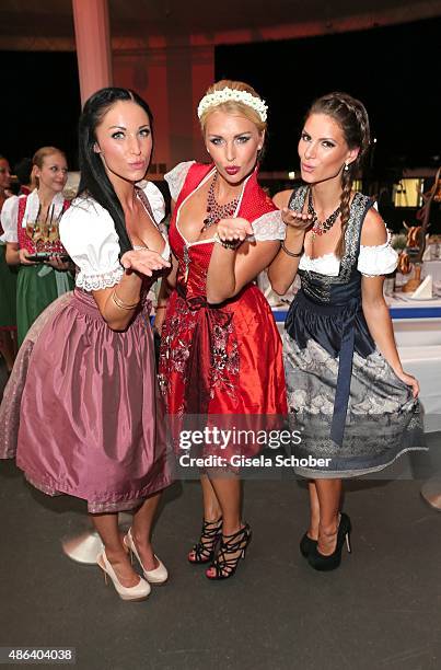 Laura Kaiser, Denise Cotte and Verena Stangl during the Angermaier Trachten-Nacht 2015 at Postpalast in Munich on September 3, 2015 in Munich,...