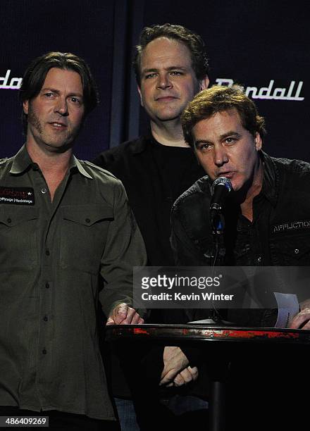 Hosts Don Jamieson, Eddie Trunk and Jim Florentine speak onstage at the 2014 Revolver Golden Gods Awards at Club Nokia on April 23, 2014 in Los...
