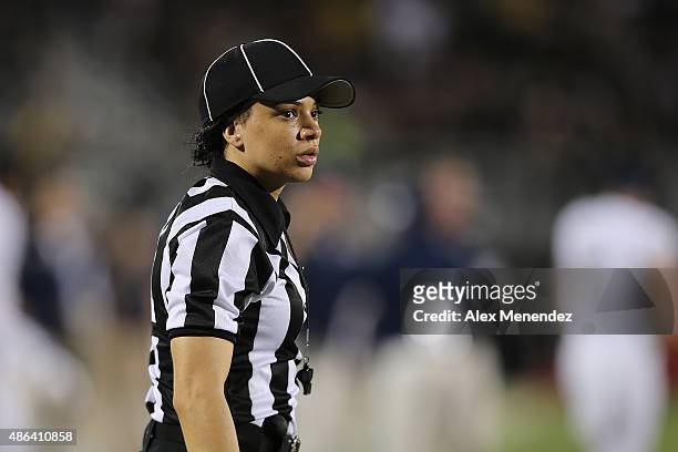Head Linesman Maia Chaka is seen during a NCAA football game between the FIU Golden Panthers and the UCF Knights at Bright House Networks Stadium on...