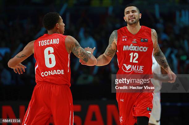 Hector Hernandez and Juan Toscano of Mexico celebrate during a match between Panama and Mexico as part of the 2015 FIBA Americas Championship for Men...