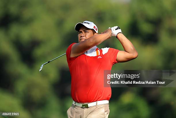 Chapchai Nirat of Thailand in action during round one of the CIMB Niaga Indonesian Masters at Royale Jakarta Golf Club on April 24, 2014 in Jakarta,...