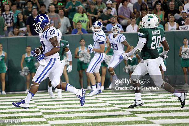 Shaquille Powell of the Duke Blue Devils scores a touchdown against the Tulane Green Wave on September 3, 2015 in New Orleans, Louisiana.