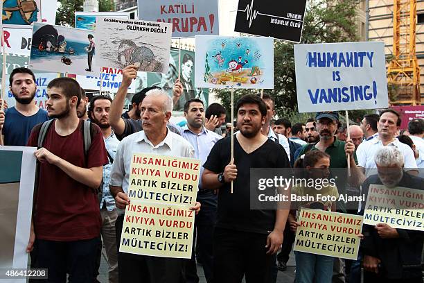 Banner reads: " Mankind is dying... Humanity hit the shore! ". The demonstrators protested against the UN's Refugee Policy and EU's on Istiklal...