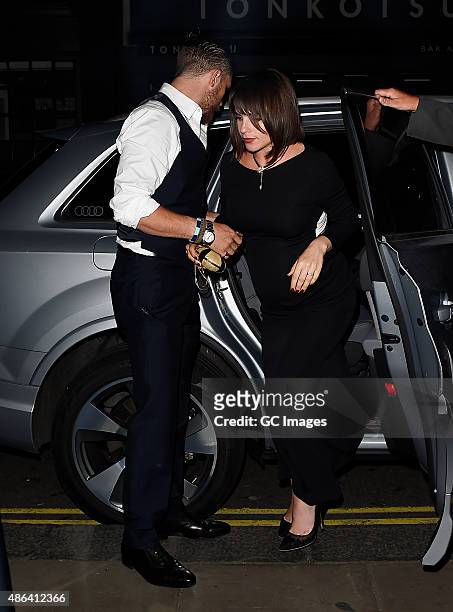Tom Hardy and his Wife Charlotte Riley arrive at Groucho Club in Soho on September 3, 2015 in London, England.