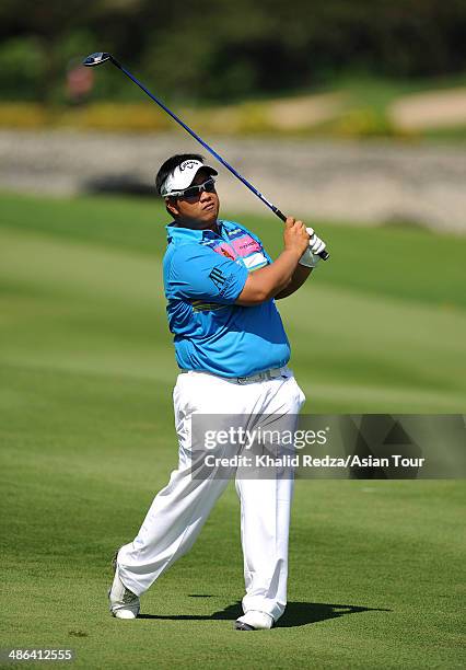 Kiradech Aphibarnrat of Thailand in action during round one of the CIMB Niaga Indonesian Masters at Royale Jakarta Golf Club on April 24, 2014 in...