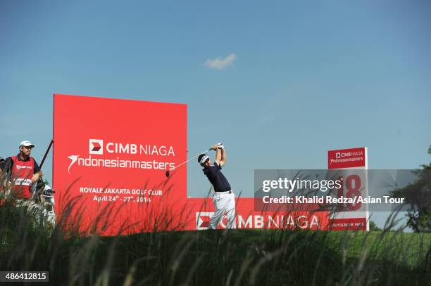 Louis Oosthuizen of South Africa in action during round one of the CIMB Niaga Indonesian Masters at Royale Jakarta Golf Club on April 24, 2014 in...