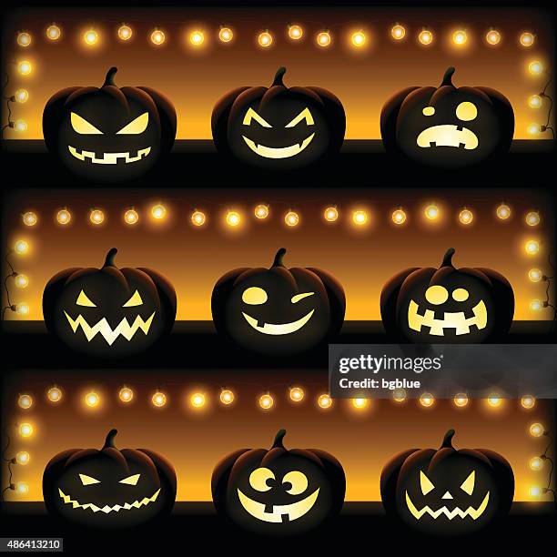 halloween pumpkin - light bulb dark background stock illustrations