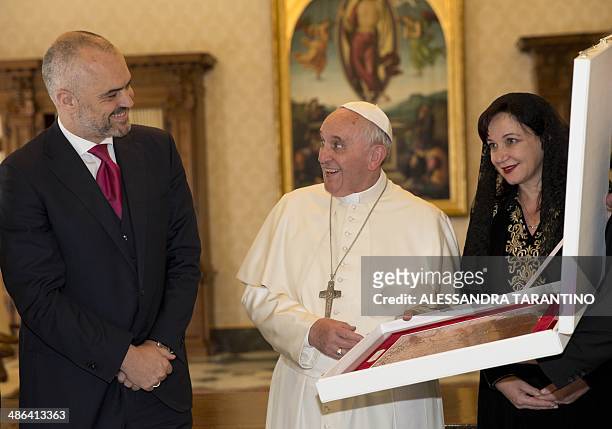 Pope Francis exchanges gifts with Prime Minister of Albania, Edi Rama and his wife Linda, during a private audience at the Vatican, on April 24,...