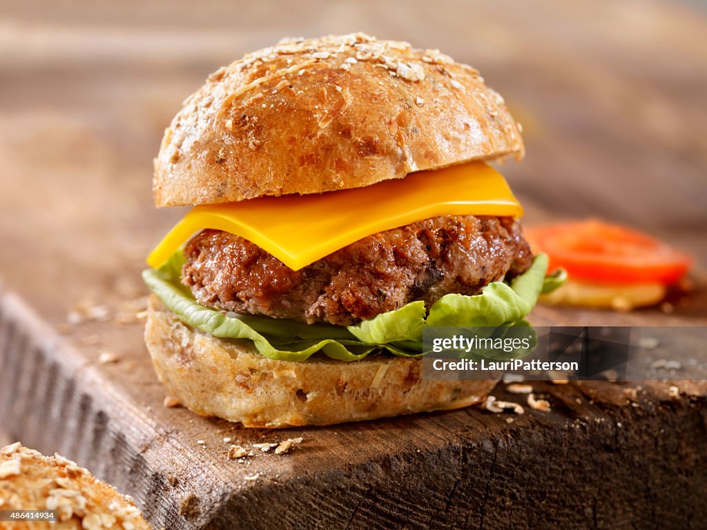 CheeseBurgeron a Rustic Wood Cutting Board