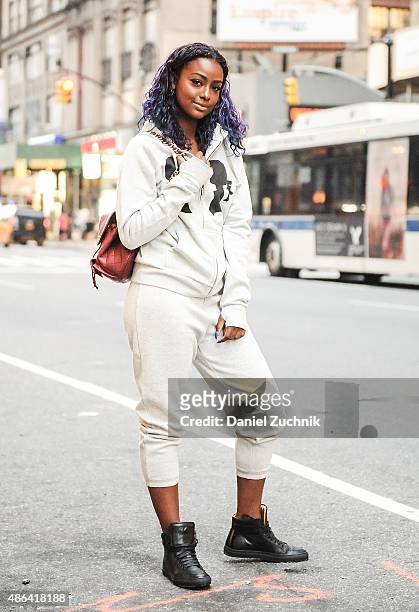 Singer Justine Skye is seen wearing a Boy Meets Girl sweatshirt and sweatpants with Koio Collective shoes and a Chanel bag during a fitting for the...