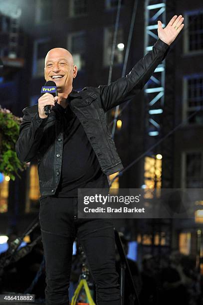 Host Howie Mandel speaks onstage at the Impractical Jokers 100th Episode Live Punishment Special at the South Street Seaport on September 3, 2015 in...