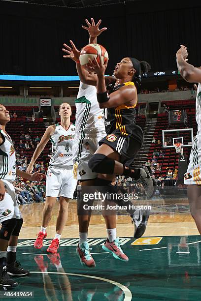 Odyssey Sims of the Tulsa Shock drives to the basket against the Seattle Storm September 3, 2015 at Key Arena in Seattle, Washington. NOTE TO USER:...