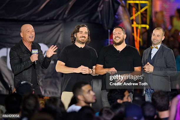 Howie Mandel, Sal Vulcano, Brian Quinn, and James Murray speak on stage during The Impractical Jokers Live Punishment Special hosted by Howie Mandel...