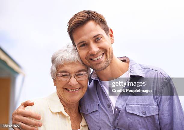 he's still her little boy - old woman young man stock pictures, royalty-free photos & images