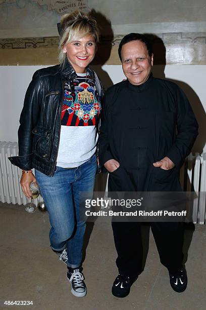 Actress Berengere Krief and Fashion Designer Azzedine Alaia attend the 'World Press Photo 2015' Exhibition Opening Party, held at Galerie Azzedine...