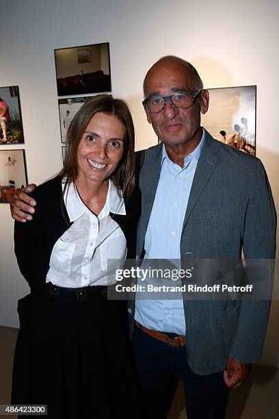 Owners of Kreo Gallery Clemence Krzentowski and her husband Didier Krzentowski attend the 'World Press Photo 2015' Exhibition Opening Party, held at...