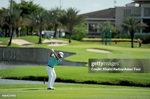 Nicholas Fung of Malaysia in action during round one of the CIMB Niaga Indonesian Masters at Royale Jakarta Golf Club on April 24, 2014 in Jakarta,...