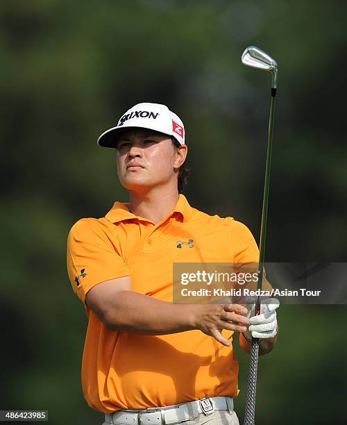 Ryan Yip of Canada plays a shot during round one of the CIMB Niaga Indonesian Masters at Royale Jakarta Golf Club on April 24, 2014 in Jakarta,...