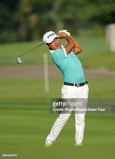 Nicholas Fung of Malaysia in action during round one of the CIMB Niaga Indonesian Masters at Royale Jakarta Golf Club on April 24, 2014 in Jakarta,...