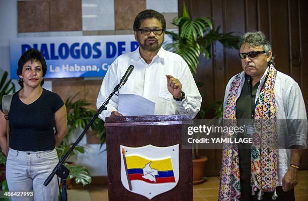 Commander of the FARC-EP leftist guerrillas Ivan Marquez reads a statement at the Convention Palace in Havana during the peace talks with the...