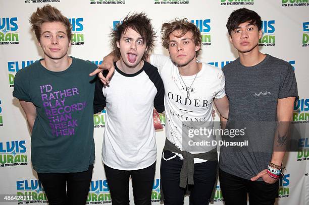 Luke Hemmings, Michael Clifford, Ashton Irwin, and Calum Hood of 5 Seconds Of Summer visit The "Elvis Duran Z100 Morning Show" at Z100 Studio on...