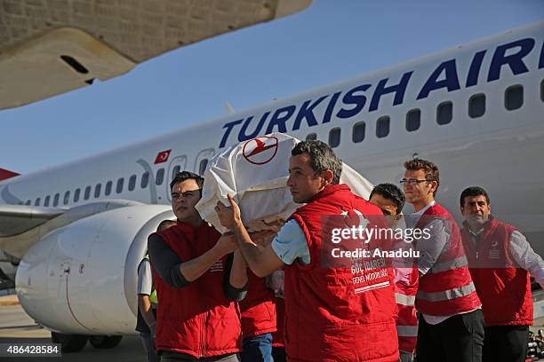 Coffins of Syrian children Aylan his brother Galip and their mother Zahin Kurdi who drowned after their boat sank en route to the Greek islands in...