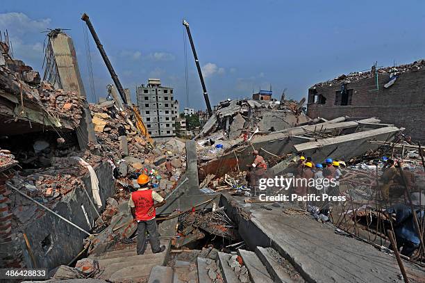 File photo dated April 29 where Rana Plaza, an eight-story commercial building, collapsed in Savar, a sub-district in the Greater Dhaka Area, the...