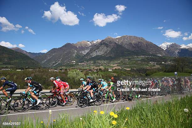 The peloton passes through the village of Dasindo during stage three of the Giro del Trentino from Mori to Roncone on April 24, 2014 in Trento, Italy.