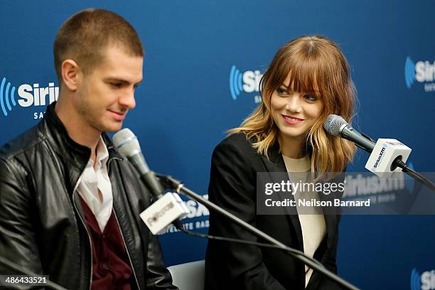 Actors Andrew Garfield and Emma Stone of the cast of "The Amazing Spider-Man 2" answer questions from fans during a SiriusXM 'Town Hall' special with...