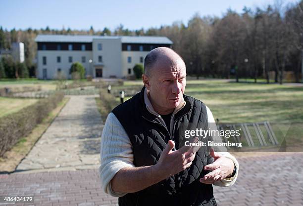 Vladimir Potanin, billionaire and owner of OAO GMK Norilsk Nickel, speaks during an interview in the grounds of the Luzhki club and resort which he...