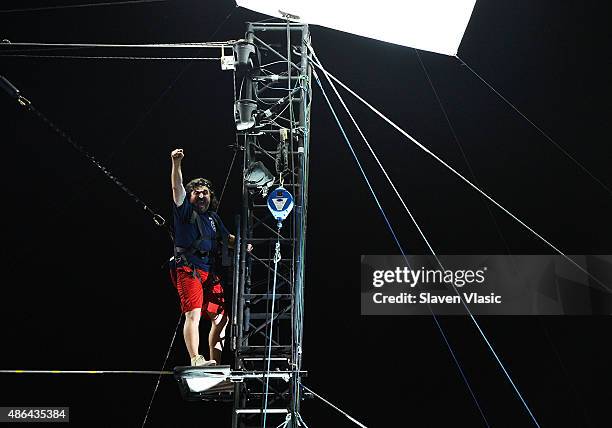 Brian "Q" Quinn walks the high-wire at the Impractical Jokers 100th Episode Live Punishment Special at the South Street Seaport at 19 Fulton Street...