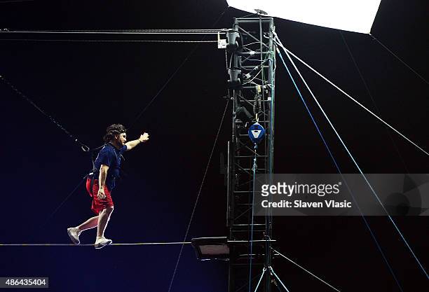 Brian "Q" Quinn walks the high-wire at the Impractical Jokers 100th Episode Live Punishment Special at the South Street Seaport at 19 Fulton Street...