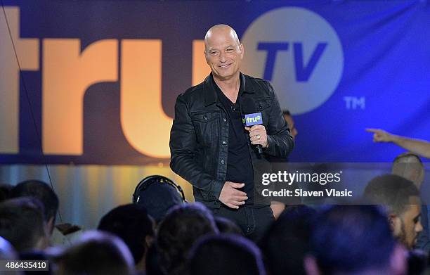 Host Howie Mandel speaks onstage at the Impractical Jokers 100th Episode Live Punishment Special at the South Street Seaport at 19 Fulton Street on...