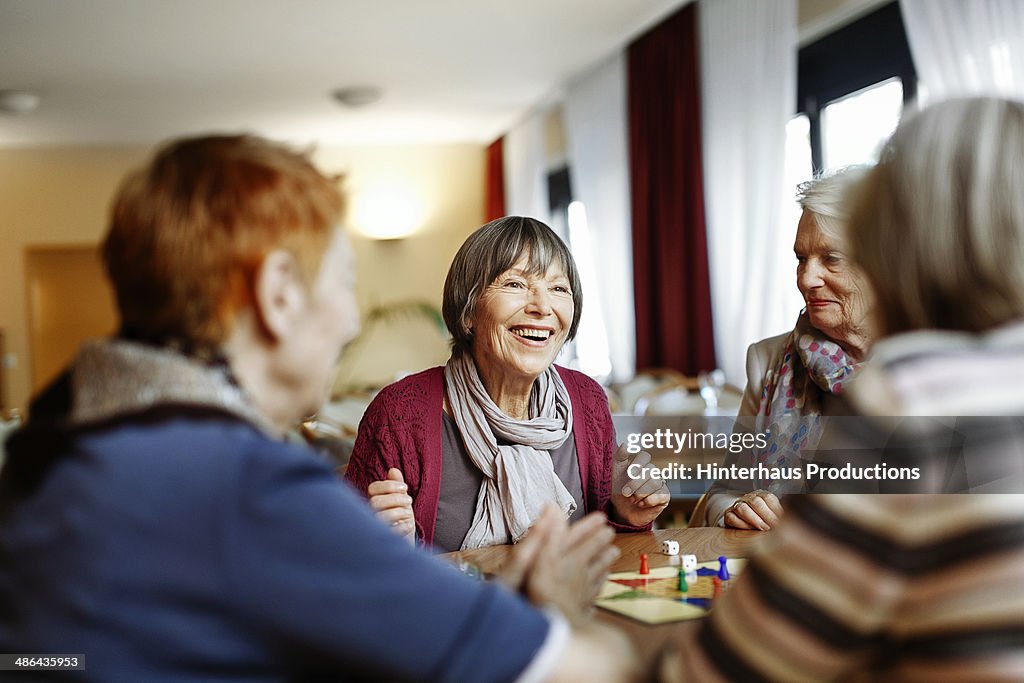Senior Women Playing Board Game
