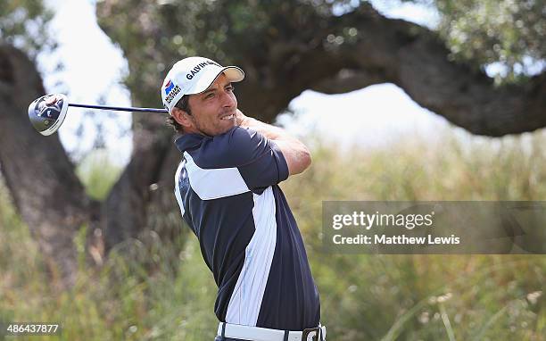 Jamie Elson of England tees off on the 1st hole during day one of the Challenge de Catalunya at the Lumine Golf and Beach Club on April 24, 2014 in...