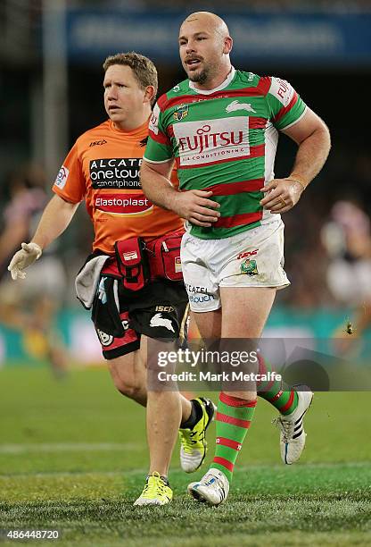 Glenn Stewart of the Rabbitohs leaves the field injured during the round 26 NRL match between the Sydney Roosters and the South Sydney Rabbitohs at...